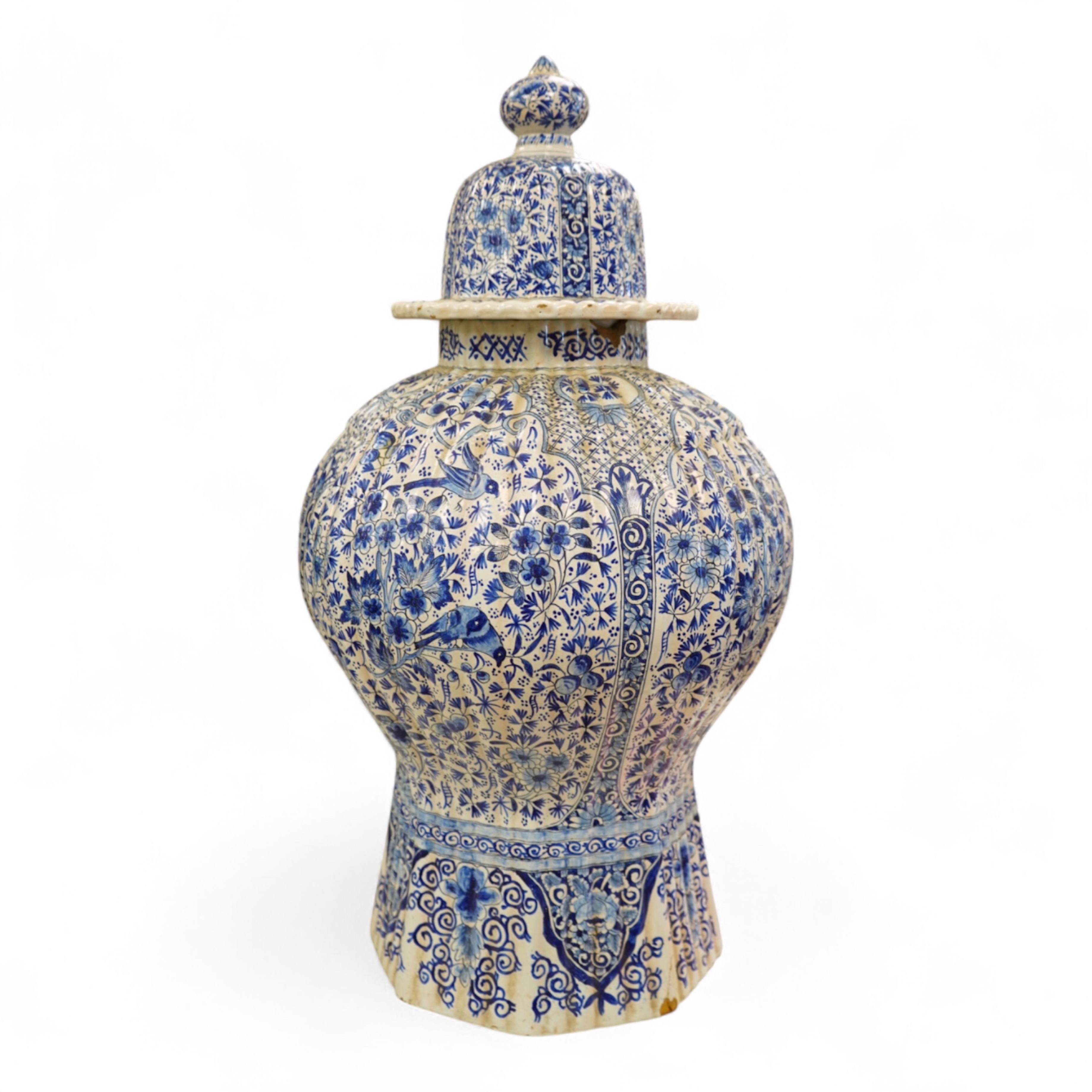 A large Delft blue and white vase and cover, 65cm tall